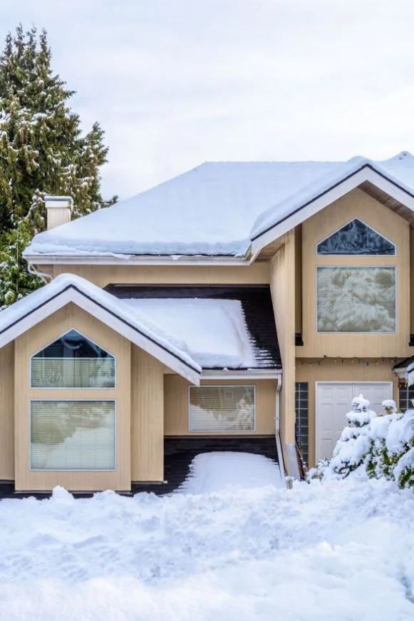 Connecticut home with snow on the ground